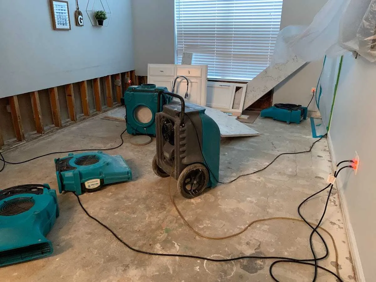 Dehumidifier in flood-cut room for Water Damage Restoration in Carmel
